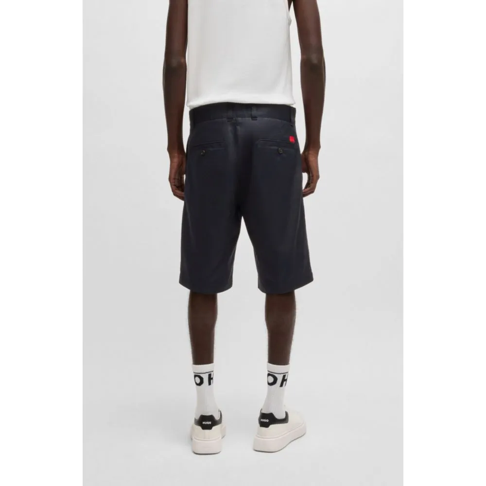 Regular-fit shorts with slim leg and buttoned pockets