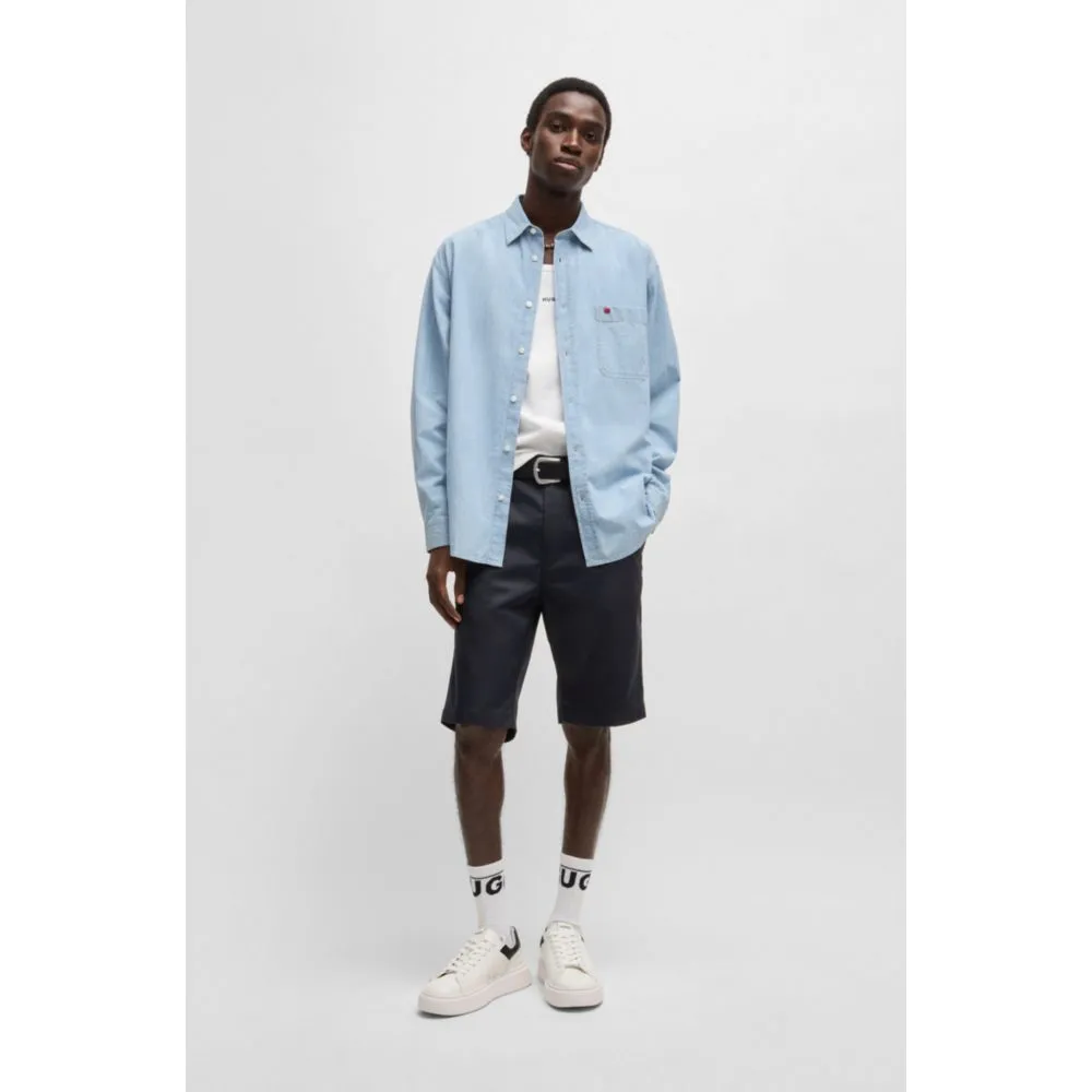 Regular-fit shorts with slim leg and buttoned pockets