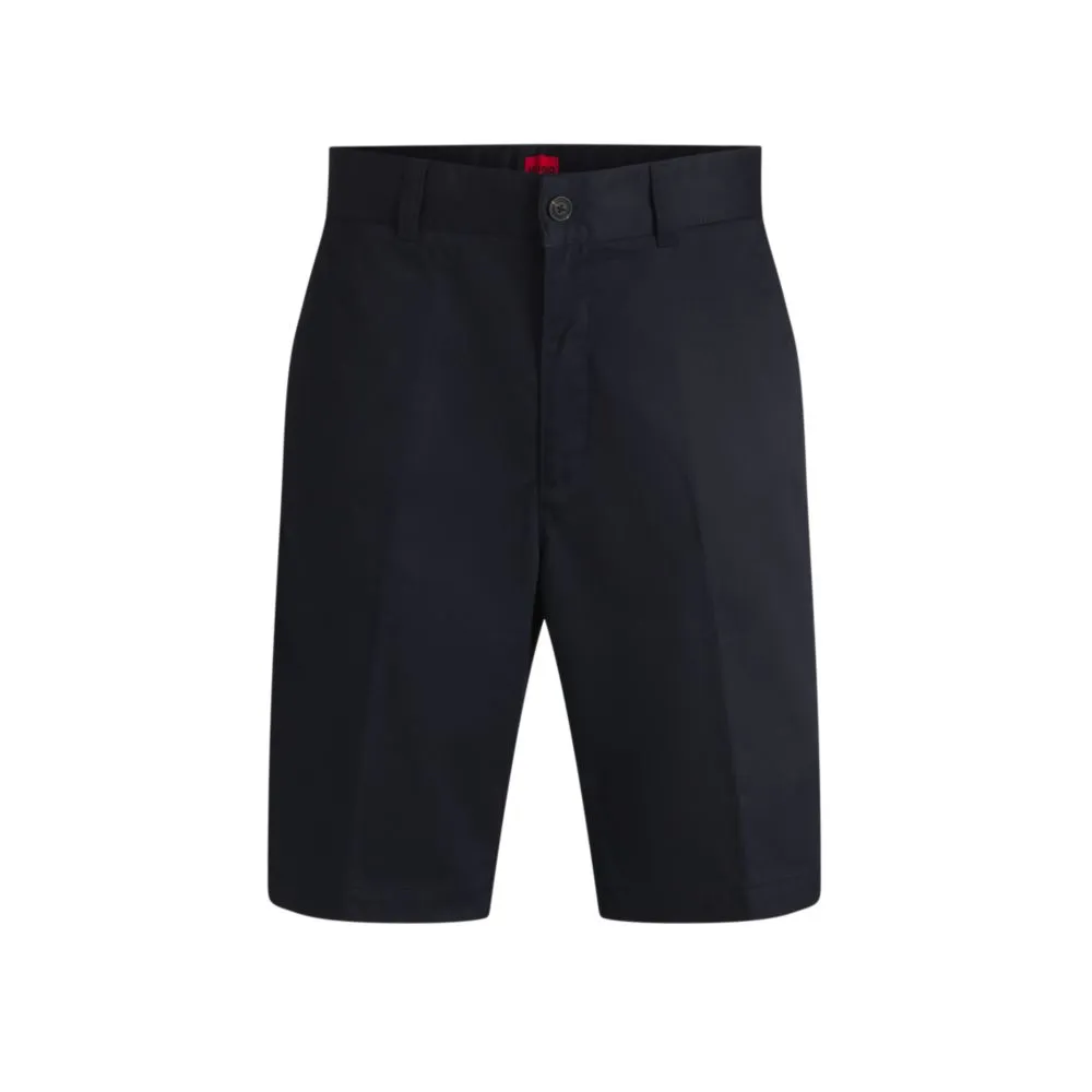 Regular-fit shorts with slim leg and buttoned pockets