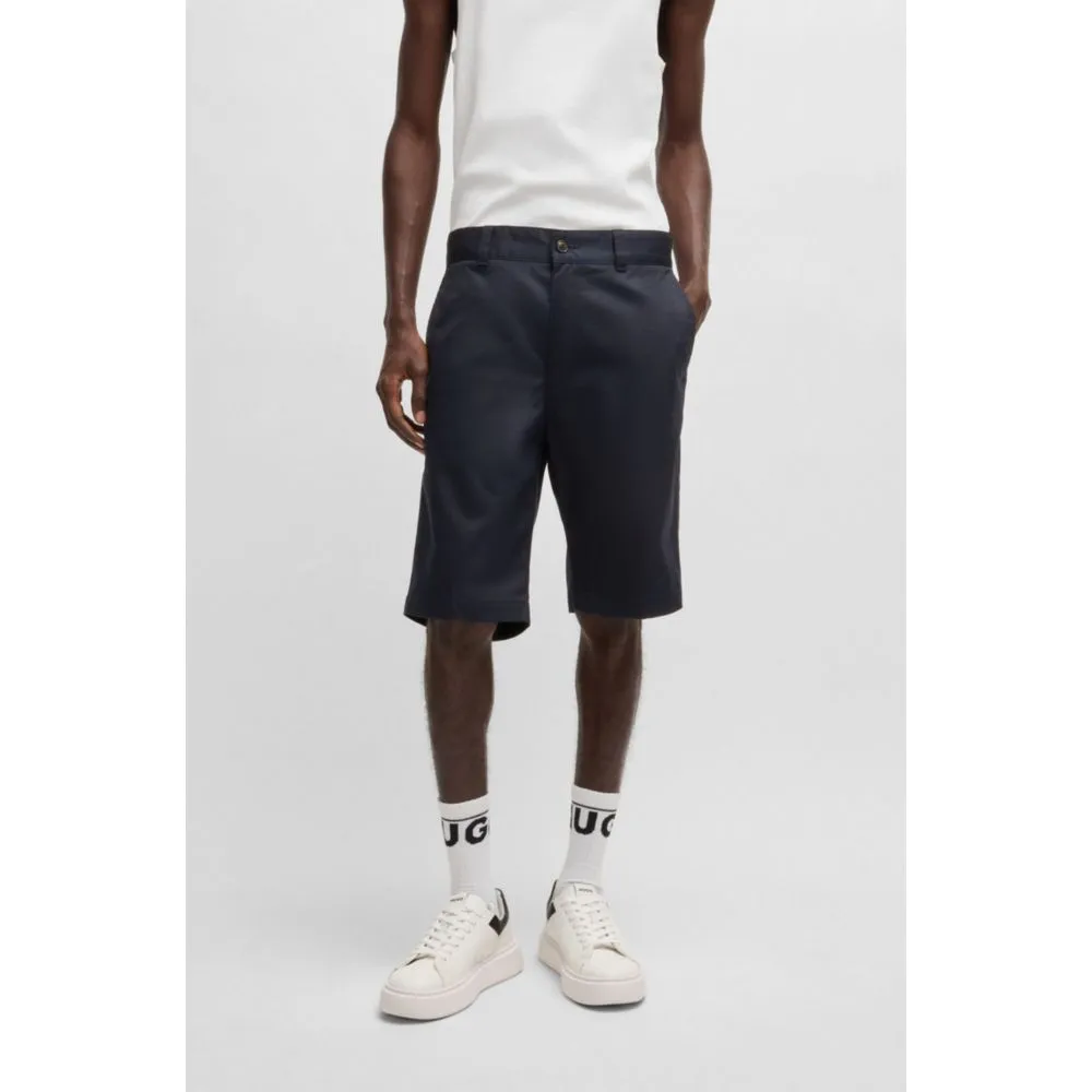 Regular-fit shorts with slim leg and buttoned pockets